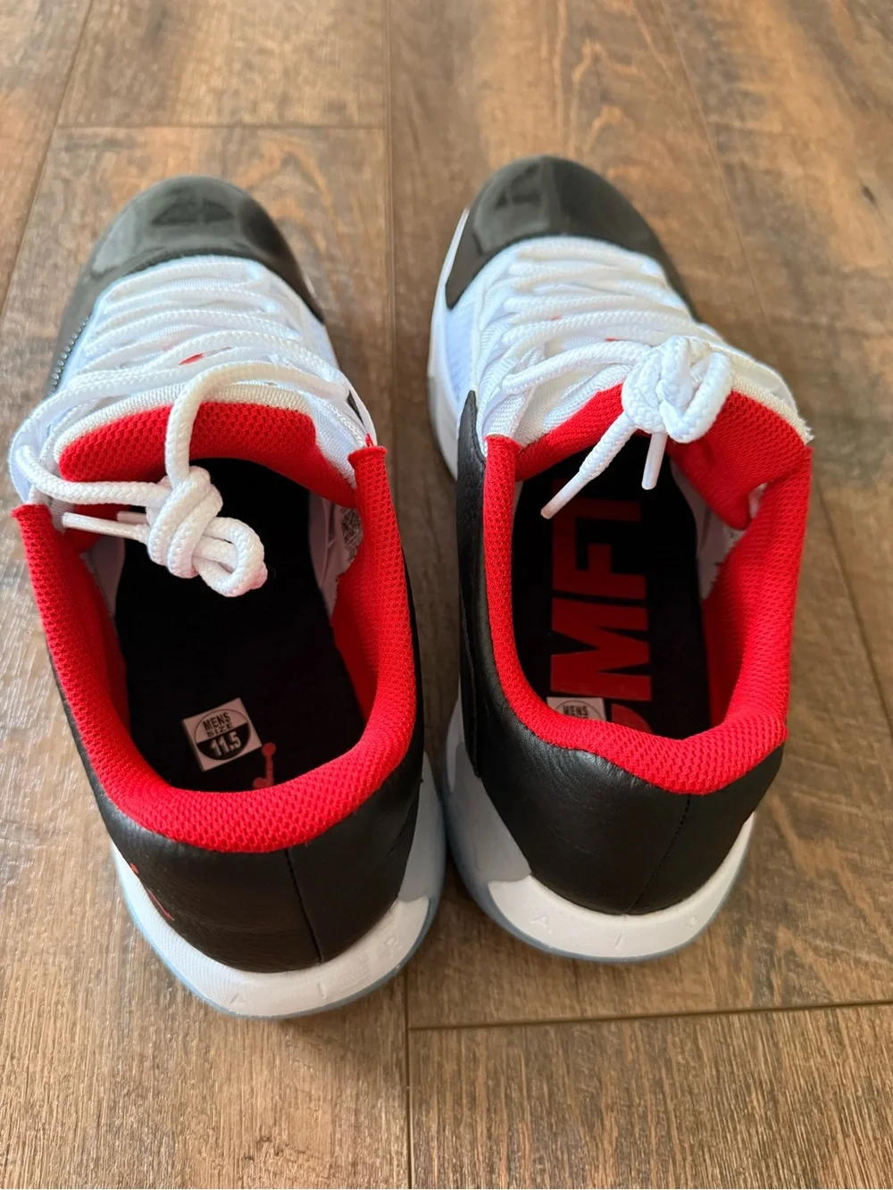 Nike Jordan 11 White/Black/Red ‘Bred’ Low-Top Sneakers